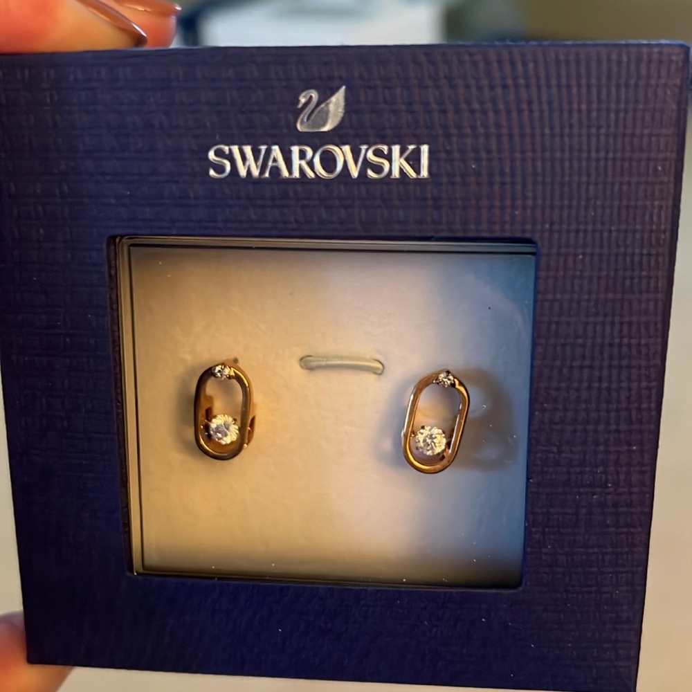 Swarovski rose gold dancing diamond studs- brand new never opened